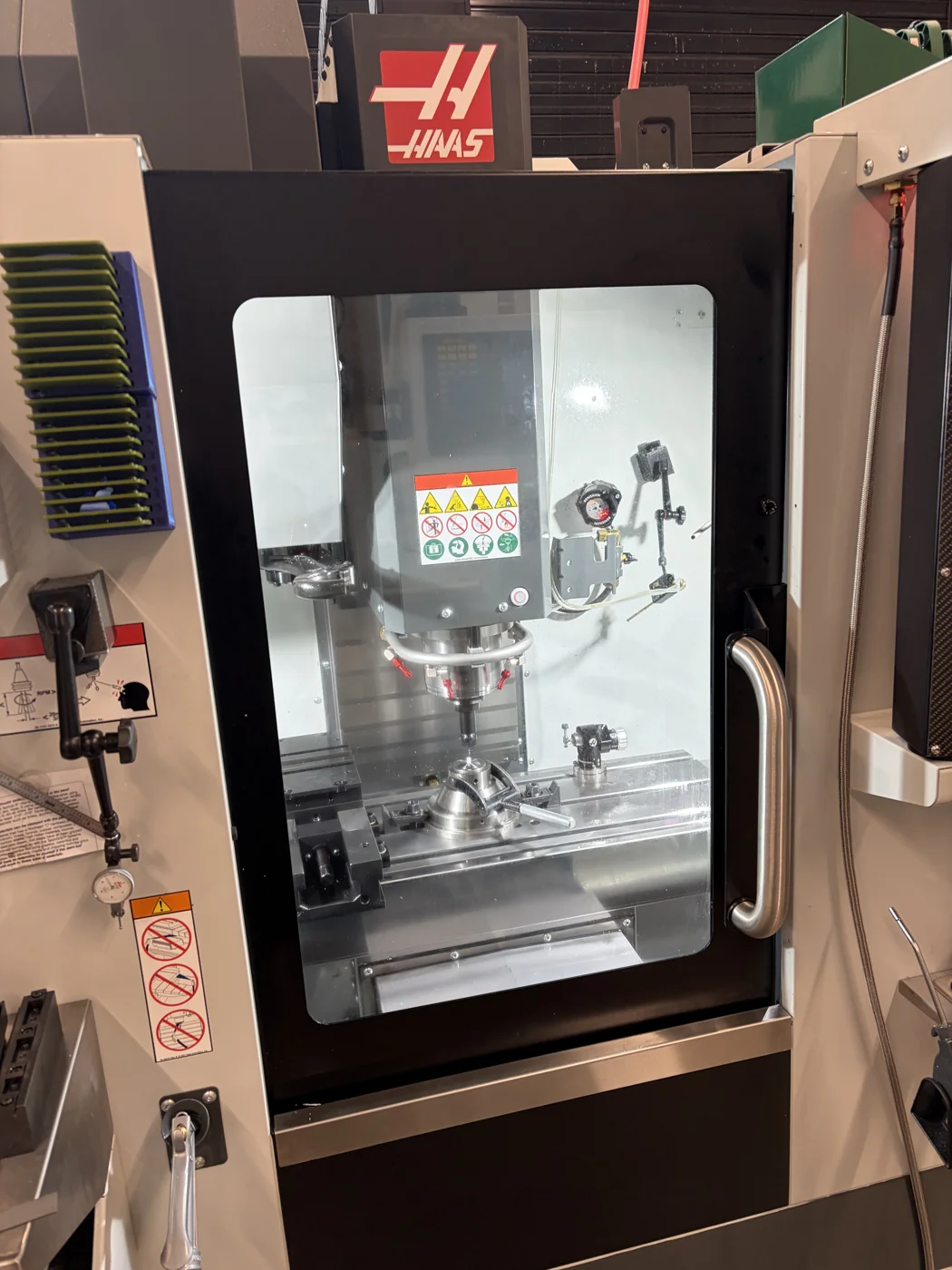 Spindle and work area inside a CNC machining center